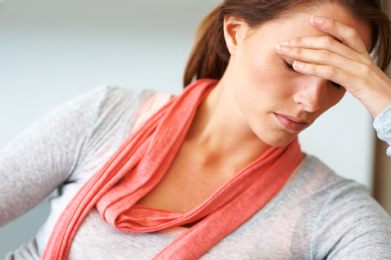 Beautiful young woman looking depressed